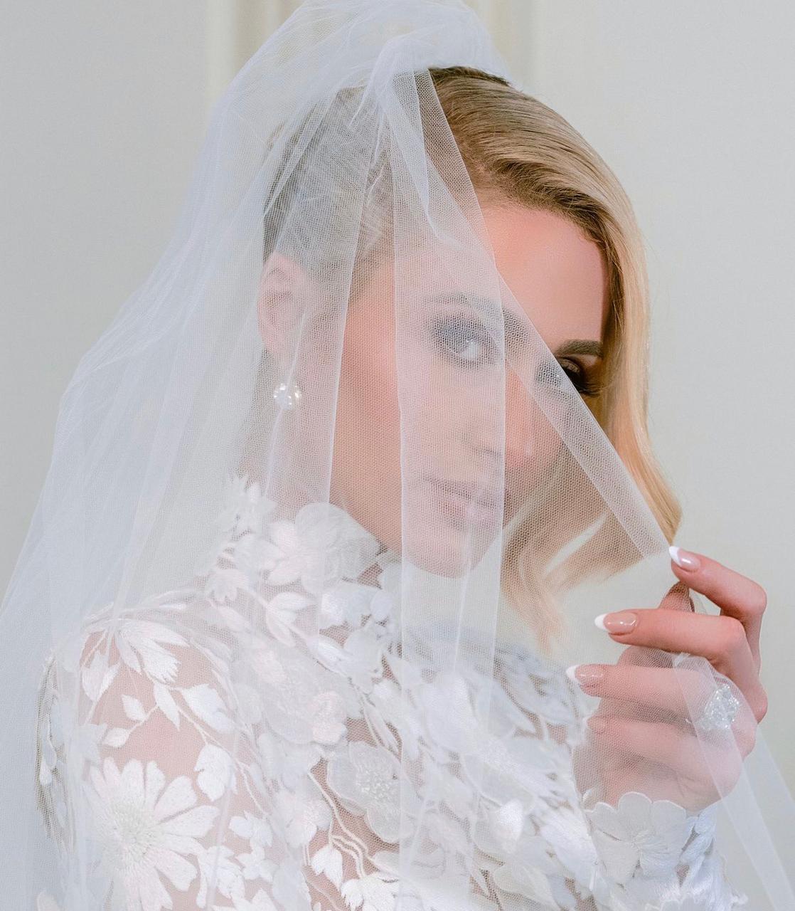 Paris Hilton weds long time friend Carter Reum